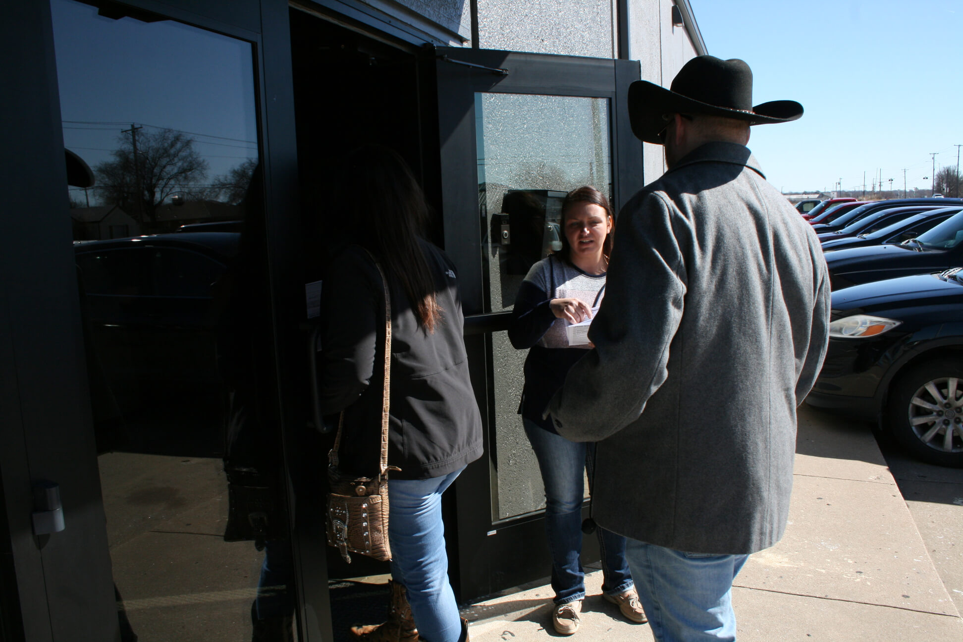 people gathered by door